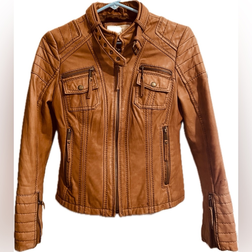 Michael Kors camel colored buttery soft leather jacket with lots of details.